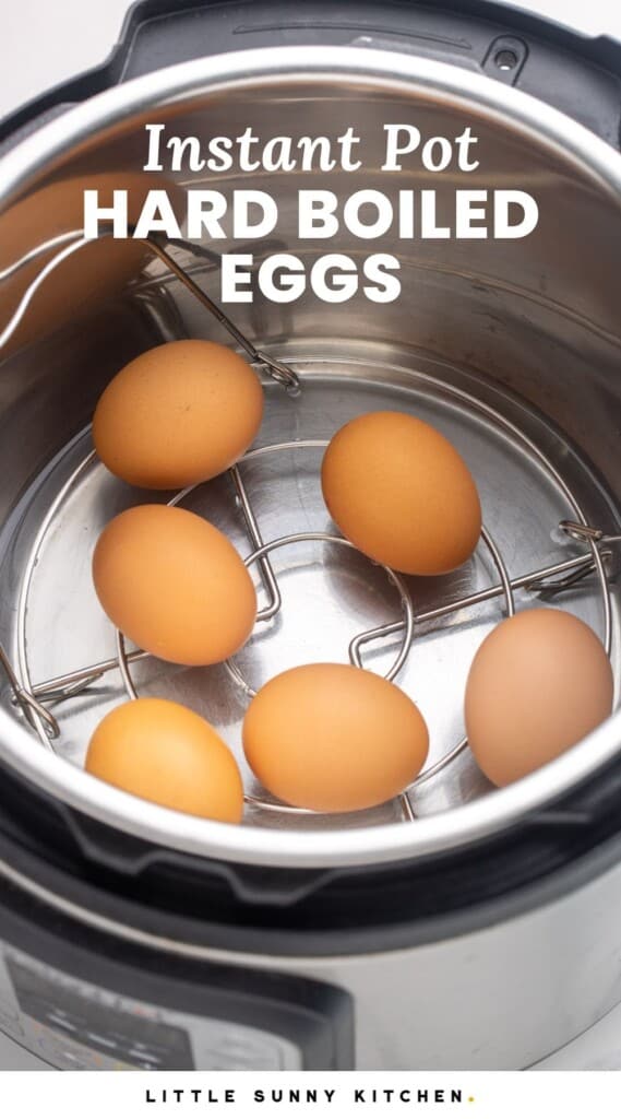 Six brown eggs in the instant pot placed on a trivet. With overlay text that says "Instant Pot hard boiled eggs"