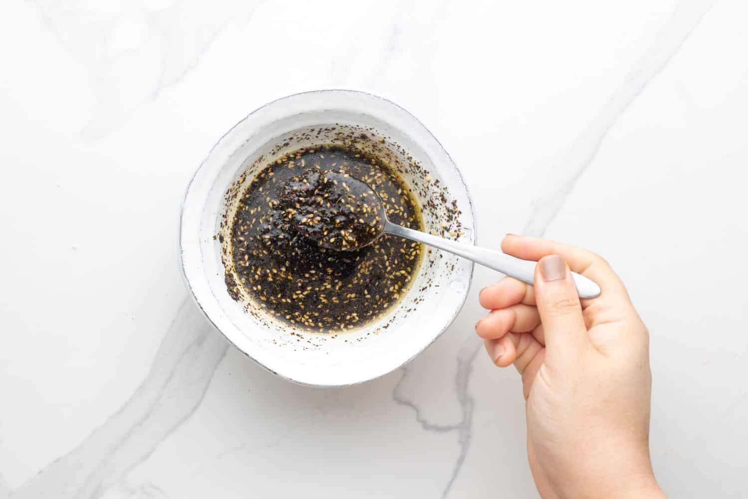 Overhead shot of za'atar olive oil spread in a bowl