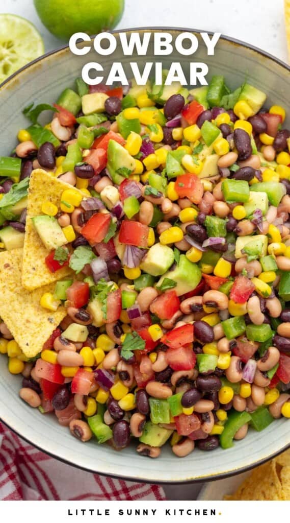 a bowl of salsa made with beans and corn, text overlay says "Cowboy Caviar"