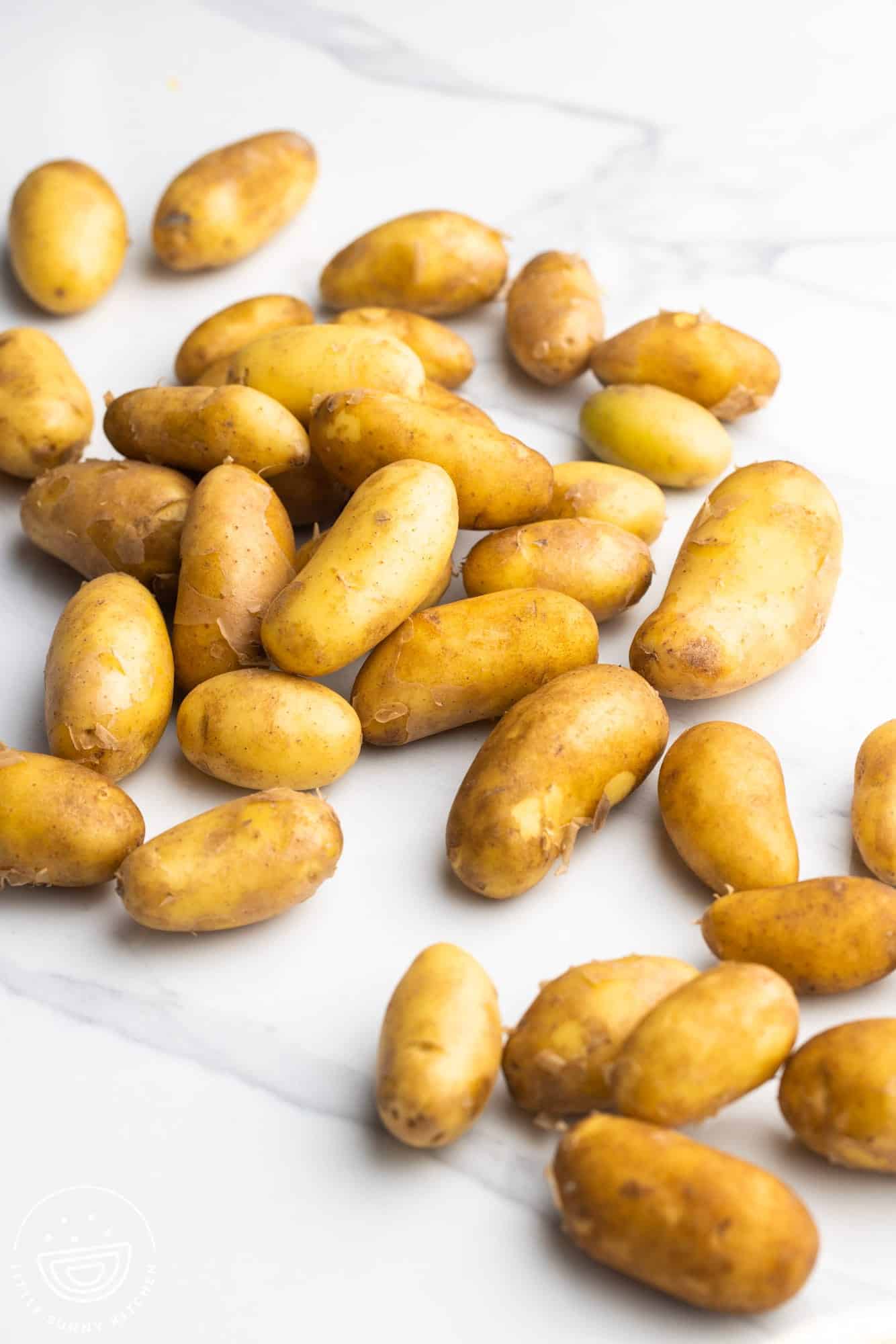 Fingerling potatoes on a marble counter