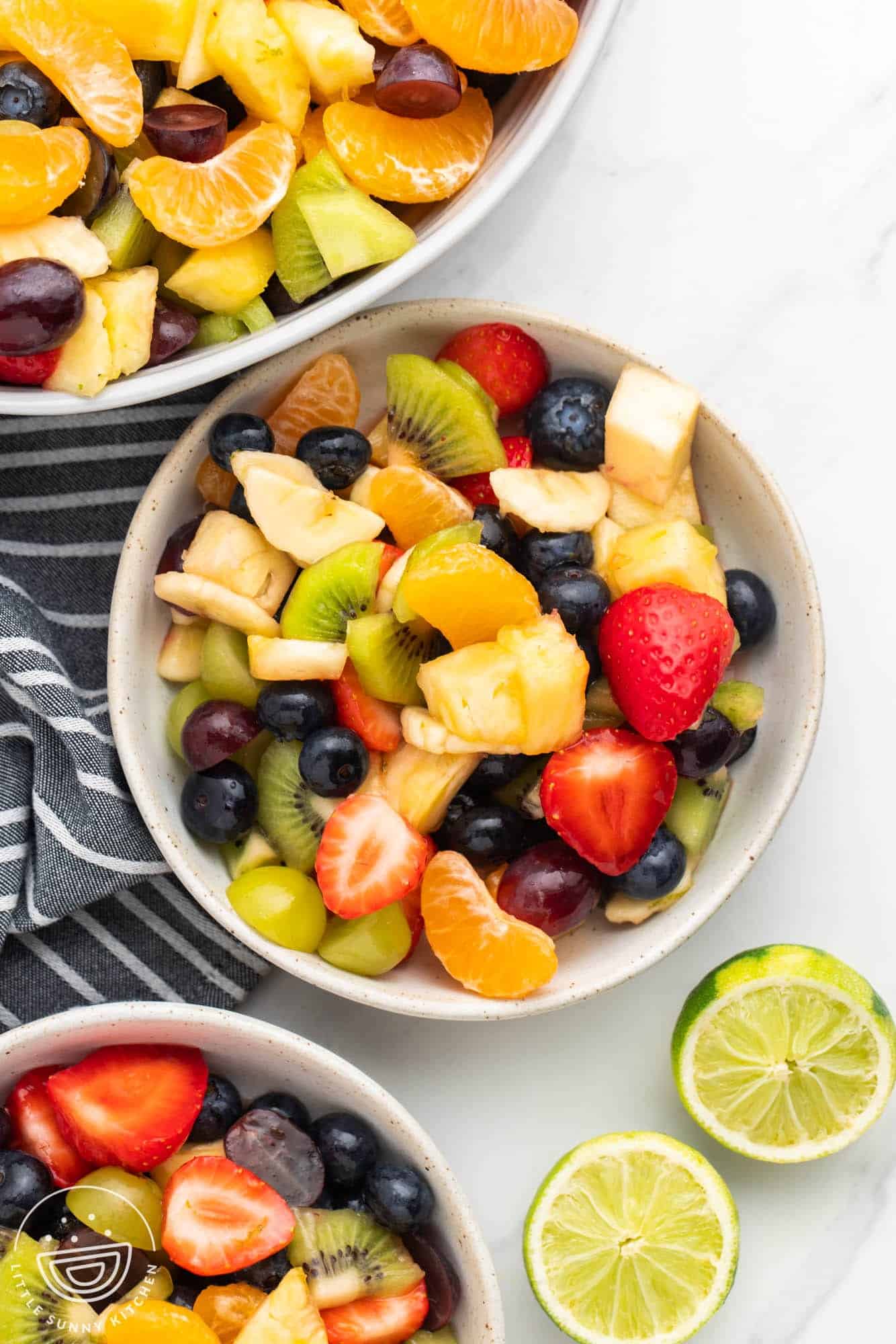 Overhead shot of fruit salad in small bowls