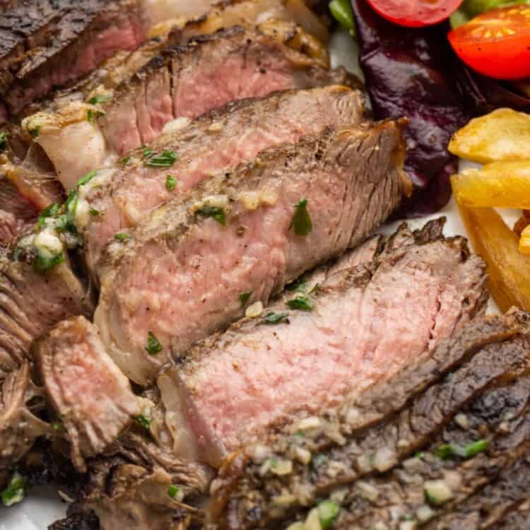 Close up shot of medium rare sliced steak
