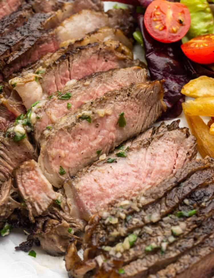 Close up shot of medium rare sliced steak