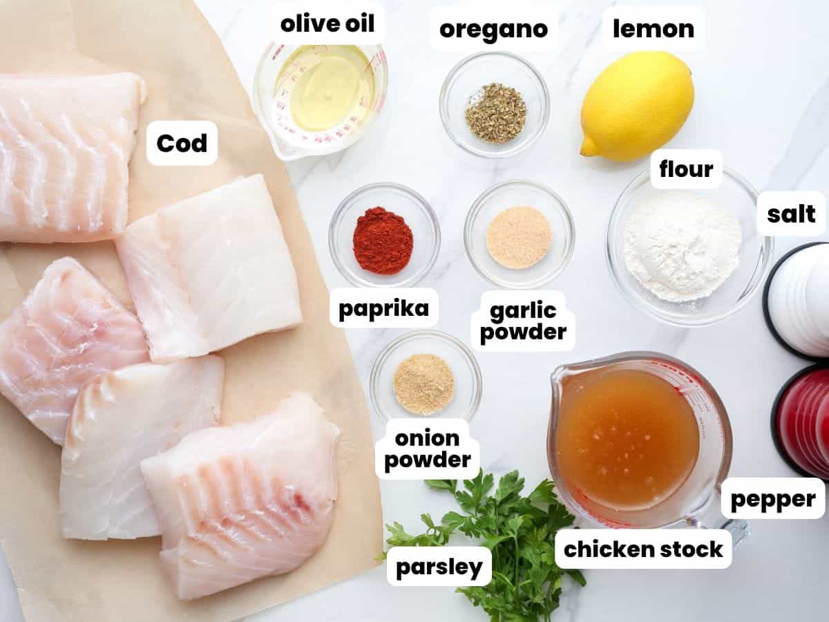 five fresh cod fillets, with the ingredients needed to make the most delicious lemon butter pan seared cod.