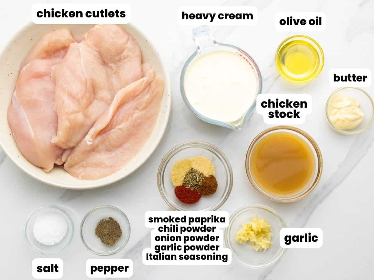 The ingredients needed to make skillet chicken lazone with heavy cream and garlic.
