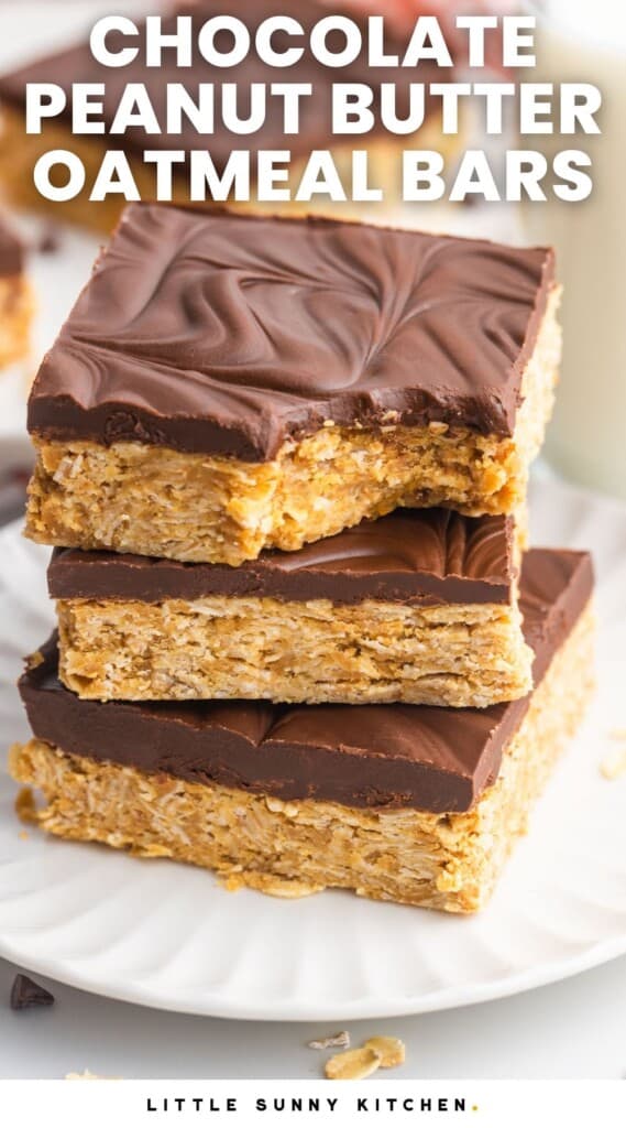 three oatmeal bars with chocolate icing stacked on a plate. Text overlay says "chocolate peanut butter oatmeal bars"