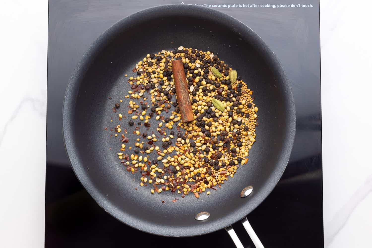 Toasting spices in a skillet