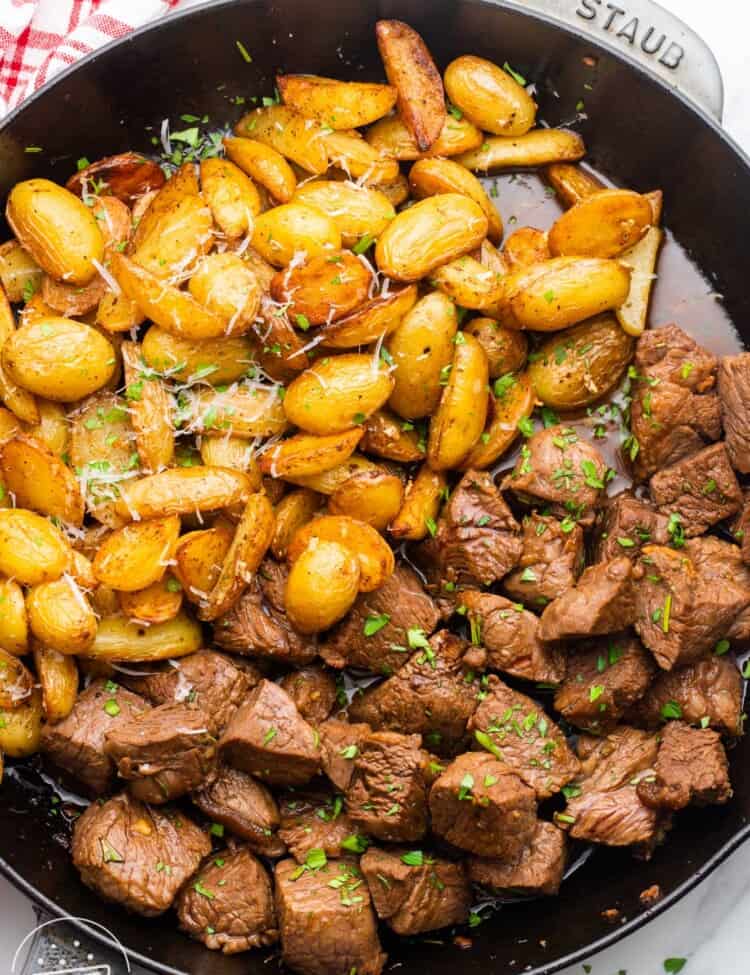Steak and potatoes in the same skillet.