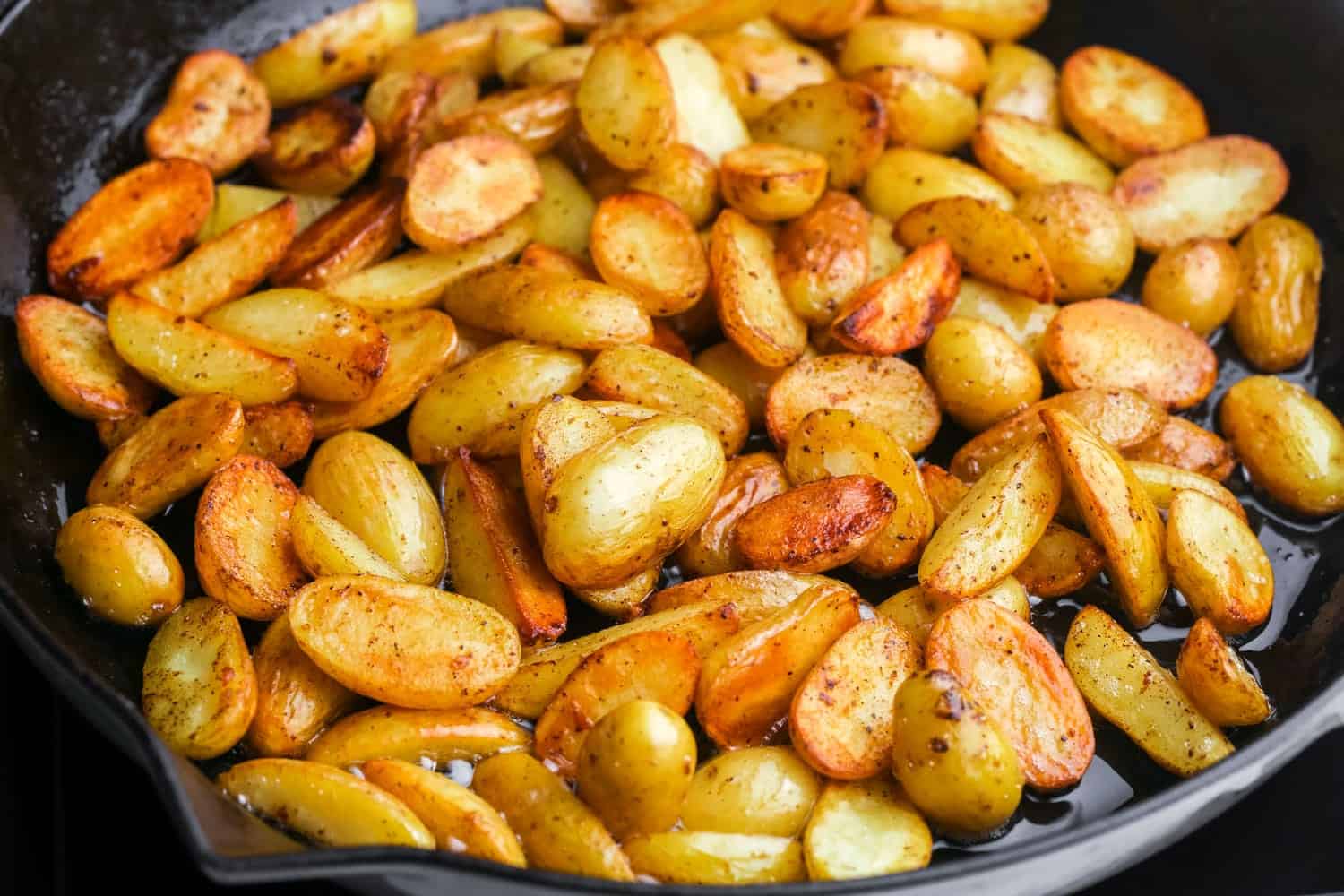 baby potatoes, browned in a skillet.