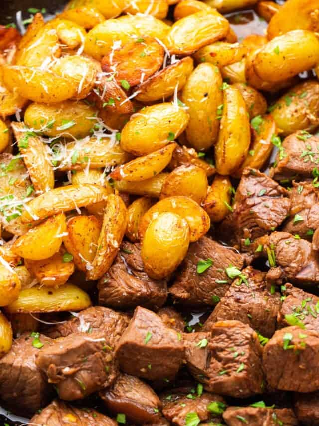 closeup of pan seared steak bites and sauteed baby potatoes.