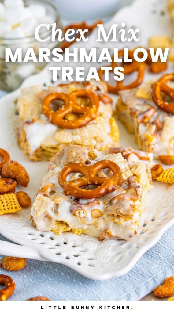A platter holding square chex marshmallow treats topped with mini pretzels. Text overlay says "chex mix marshmallow treats"