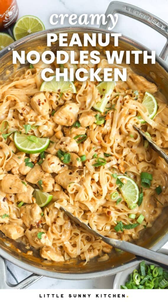 a steel skillet of noodles and chicken with lime wedges. Text overlay says "creamy peanut noodles with chicken"