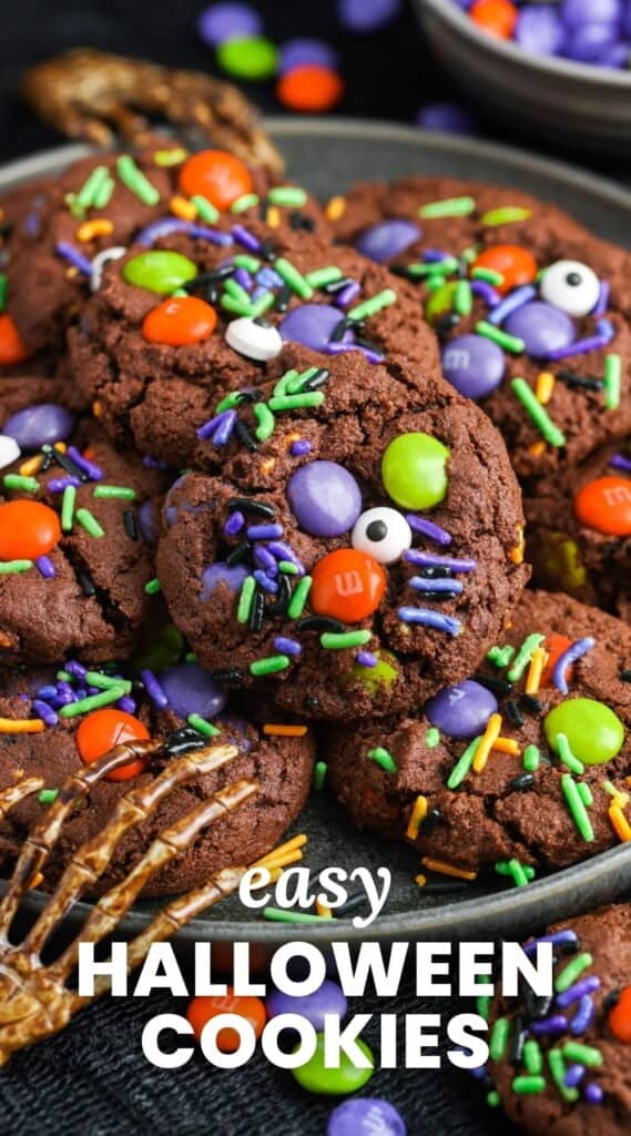 a plate of chocolate cookies with halloween decorations. Text overlay says "easy halloween cookies"
