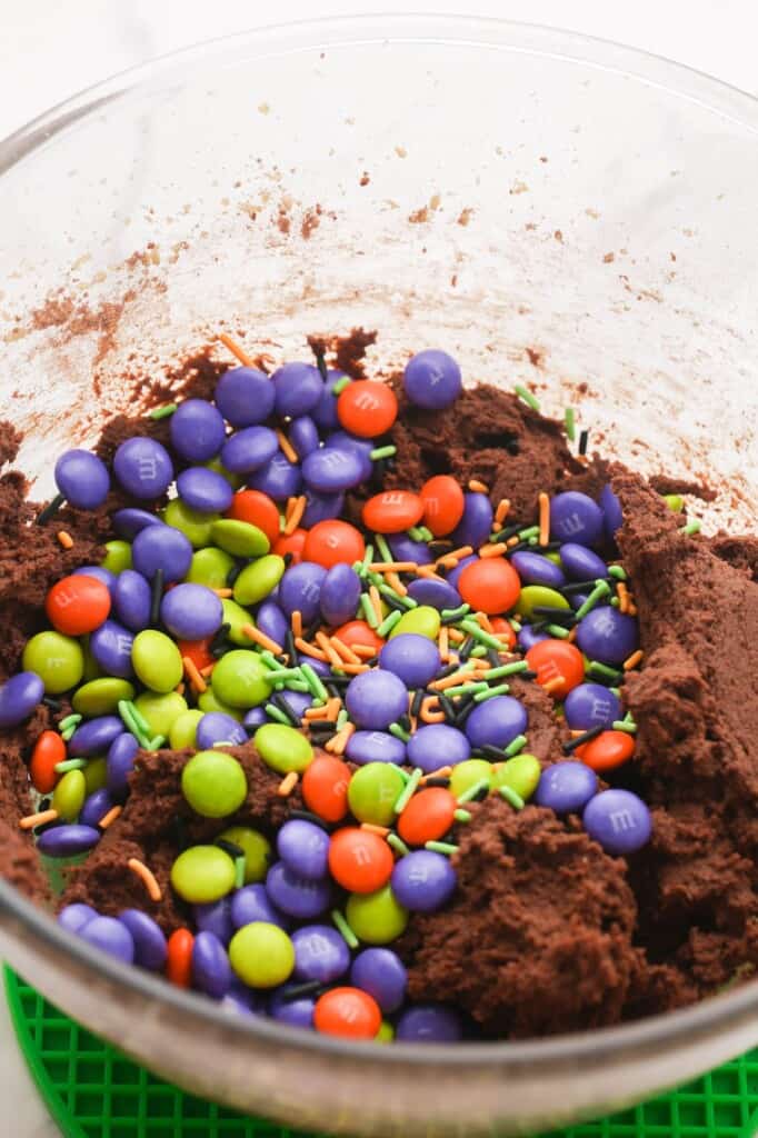 halloween m&ms mixed into chocolate cookie dough