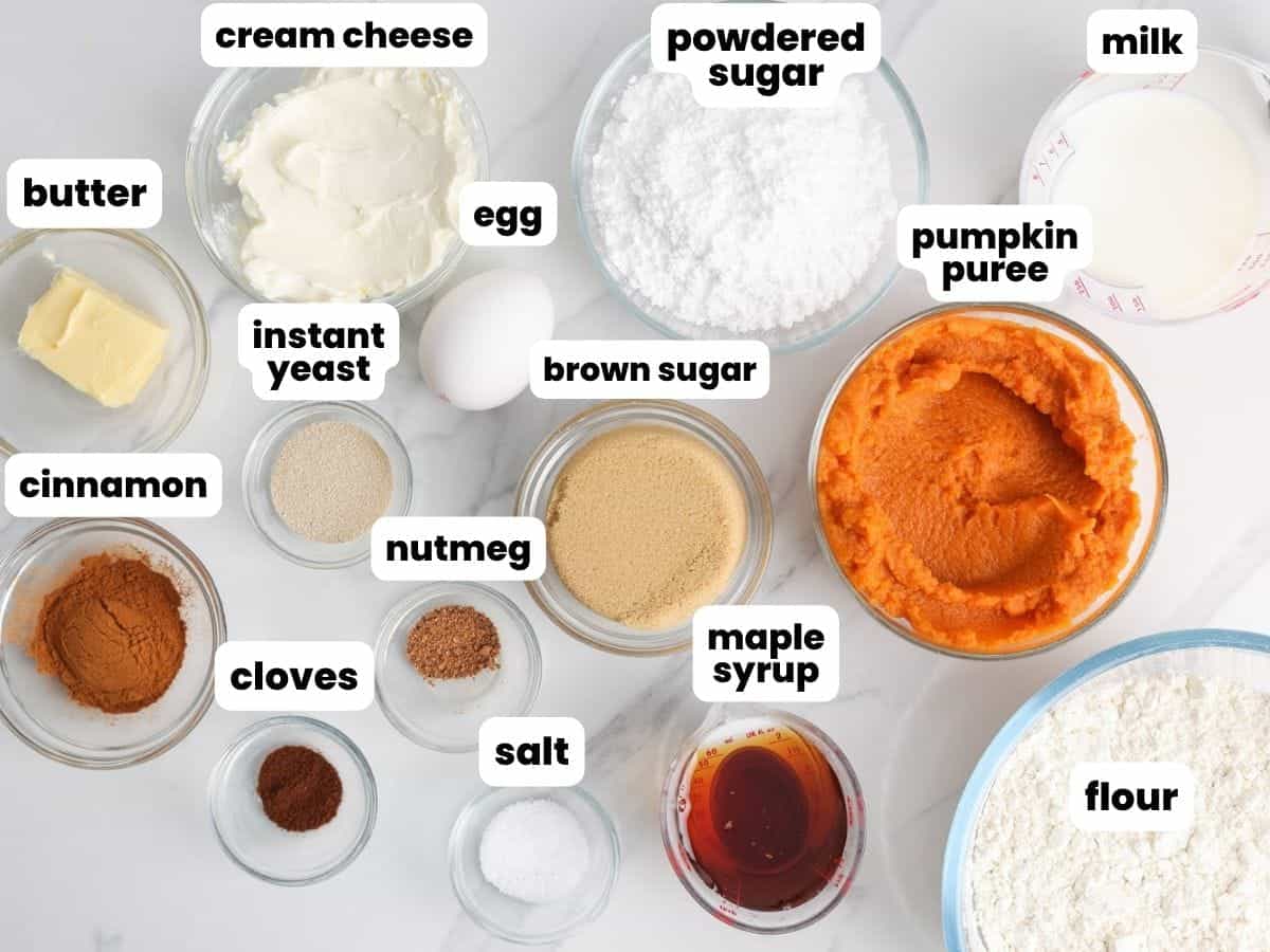 The ingredients needed to make pumpkin cinnamon rolls from scratch
