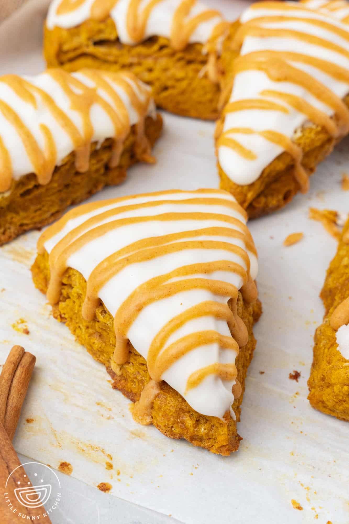 copycat starbucks pumpkin scones on a baking sheet.