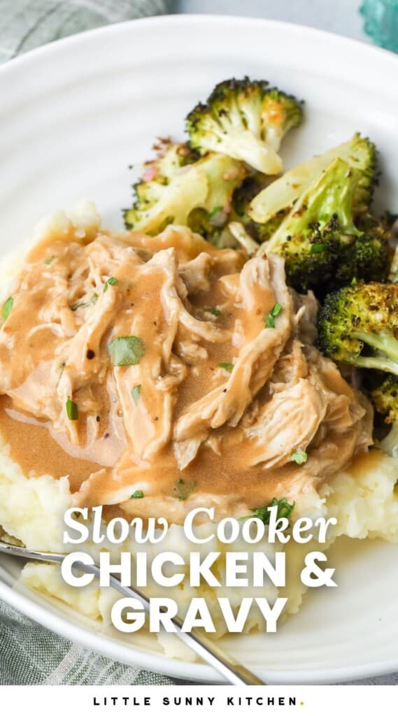 a plate of mashed potatoes with shredded chicken and roasted broccoli. Text overlay says "slow cooker chicken and gravy"
