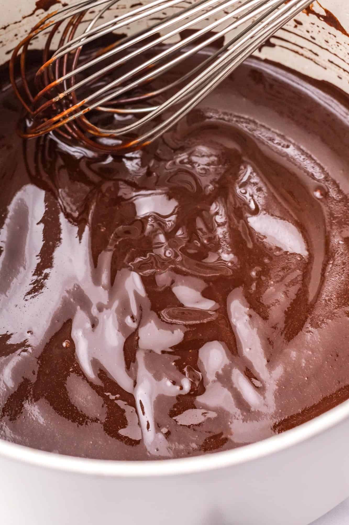 butter and cocoa powder melted in a saucepan with a whisk.