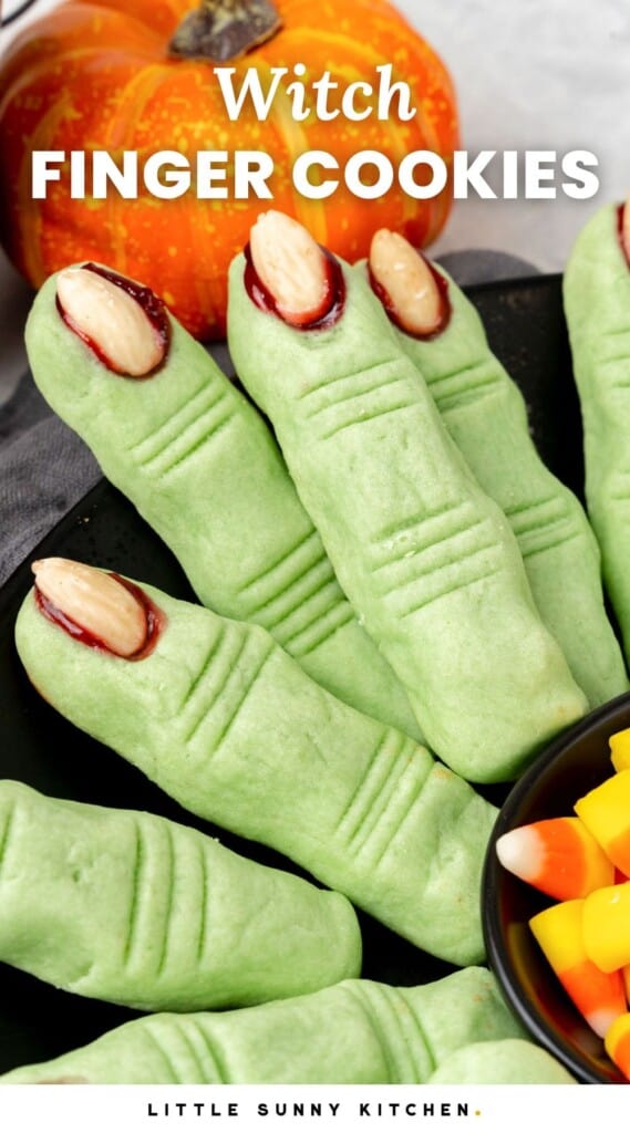 green finger shaped cookies with almond fingernails. Text overlay says "witch finger cookies"