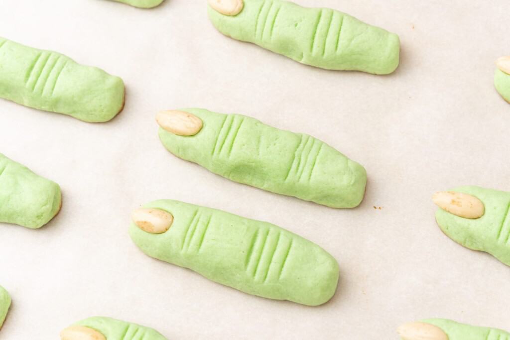 baked green finger cookies with almonds.
