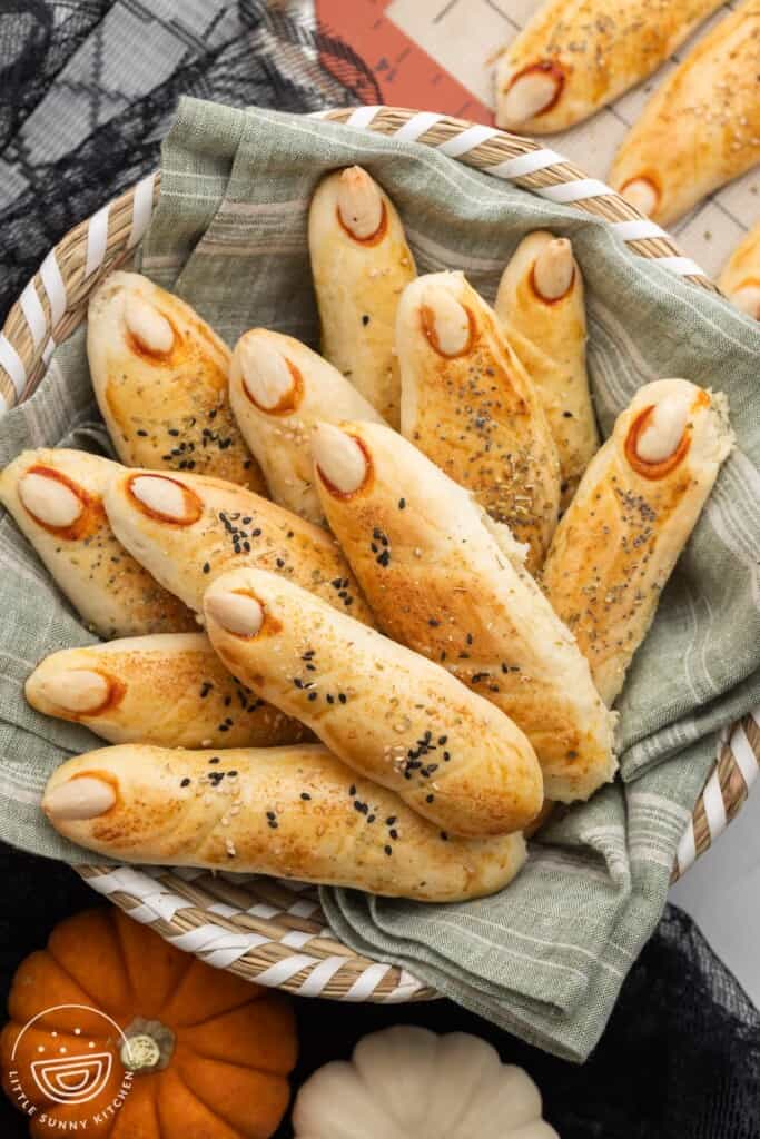 Overhead shot of witch fingers breadsticks in a bread basket