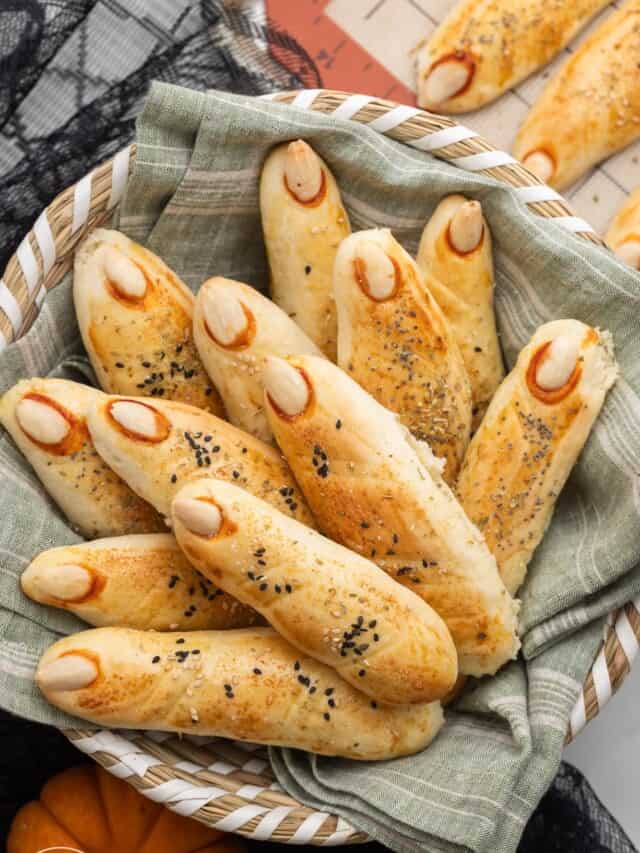 Overhead shot of witch fingers breadsticks in a bread basket
