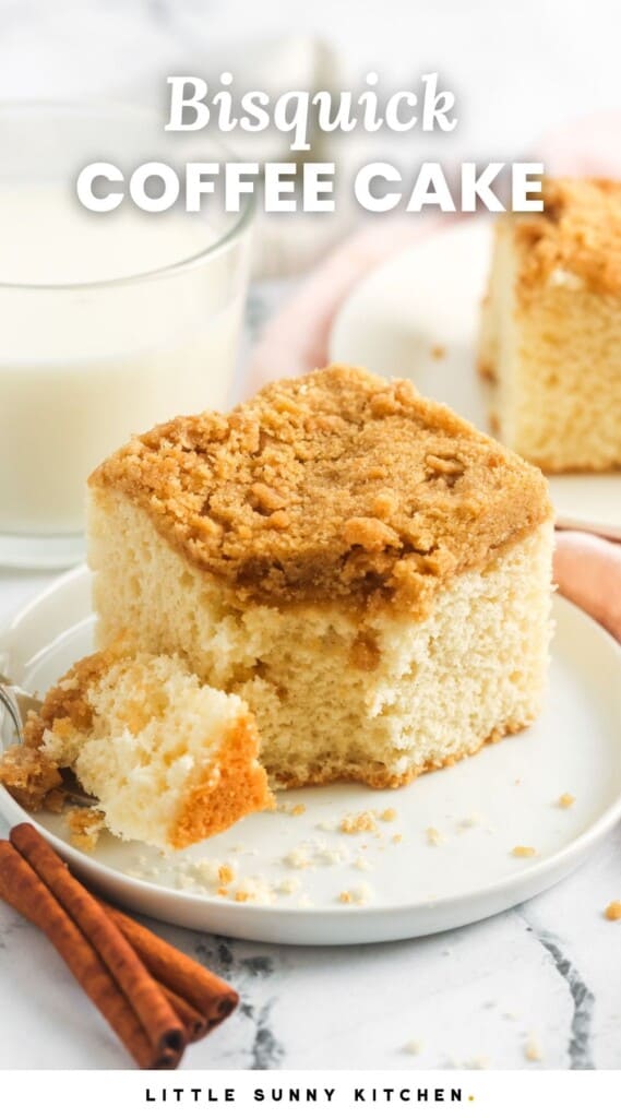 a square slice of coffee cake with a bite taken. Text overlay says "Bisquick coffee cake"