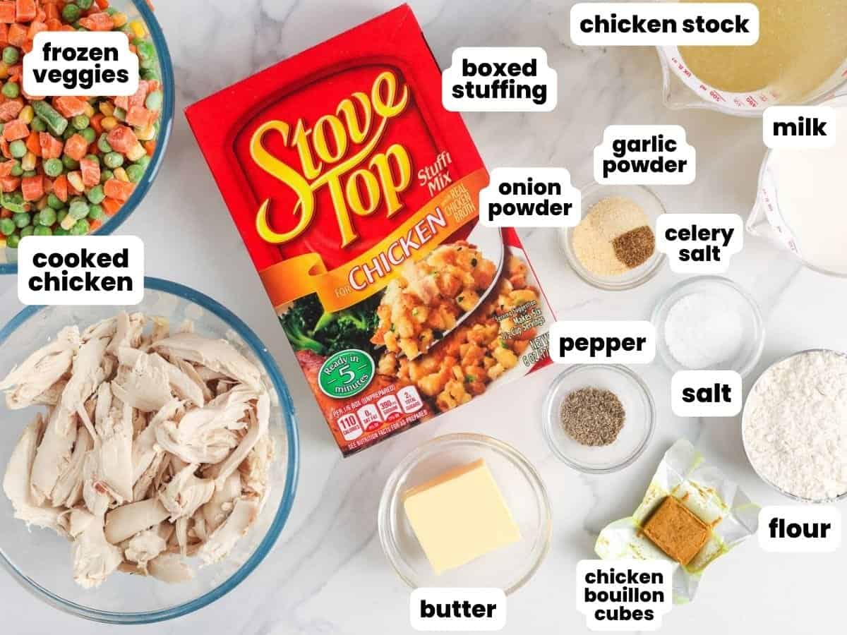The ingredients needed to make stove top chicken stuffing casserole with shredded chicken and frozen veggies.
