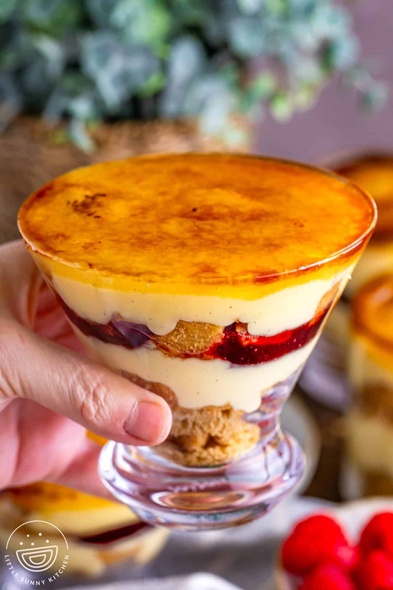 Holding a cup with creme brulee trifle