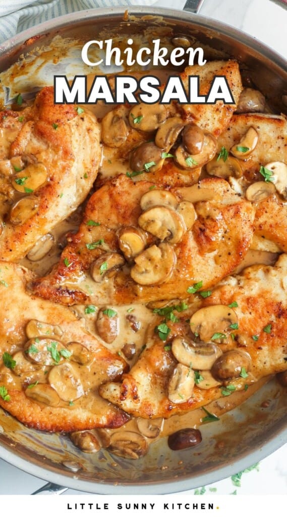 a skillet of chicken with mushrooms and a silky sauce. Text overlay says "chicken marsala"