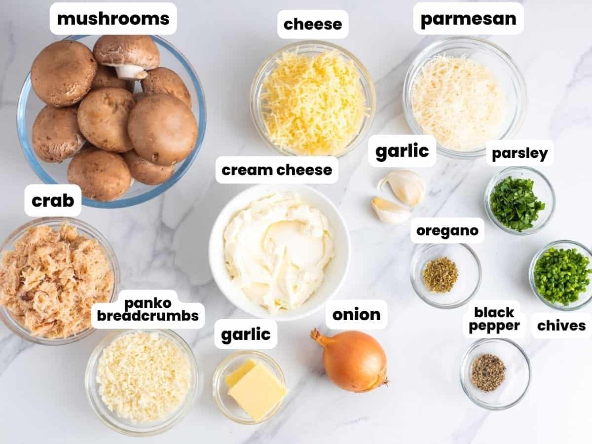 The ingredients needed to make stuffed mushrooms with lump crab and parmesan cheese. 