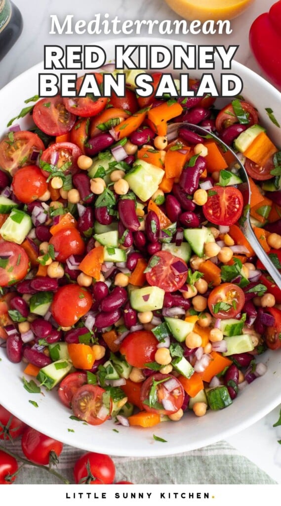 a bowl of bean salad. Text overlay says "mediterranean red kidney bean salad"