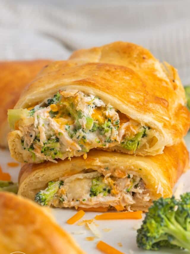 Stacked 2 pieces of crescent bakes filled with cheesy chicken and broccoli
