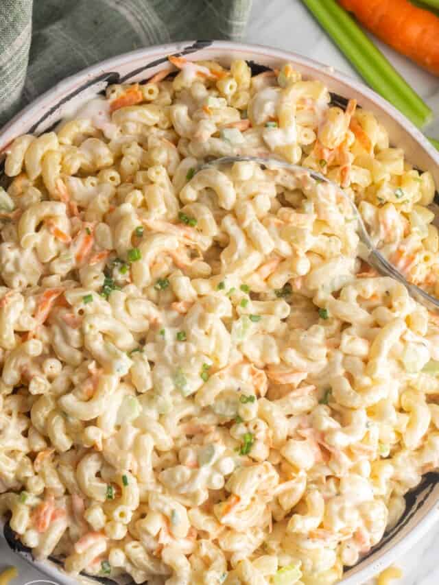 creamy hawaiian style macaroni salad in a bowl, viewed from overhead.