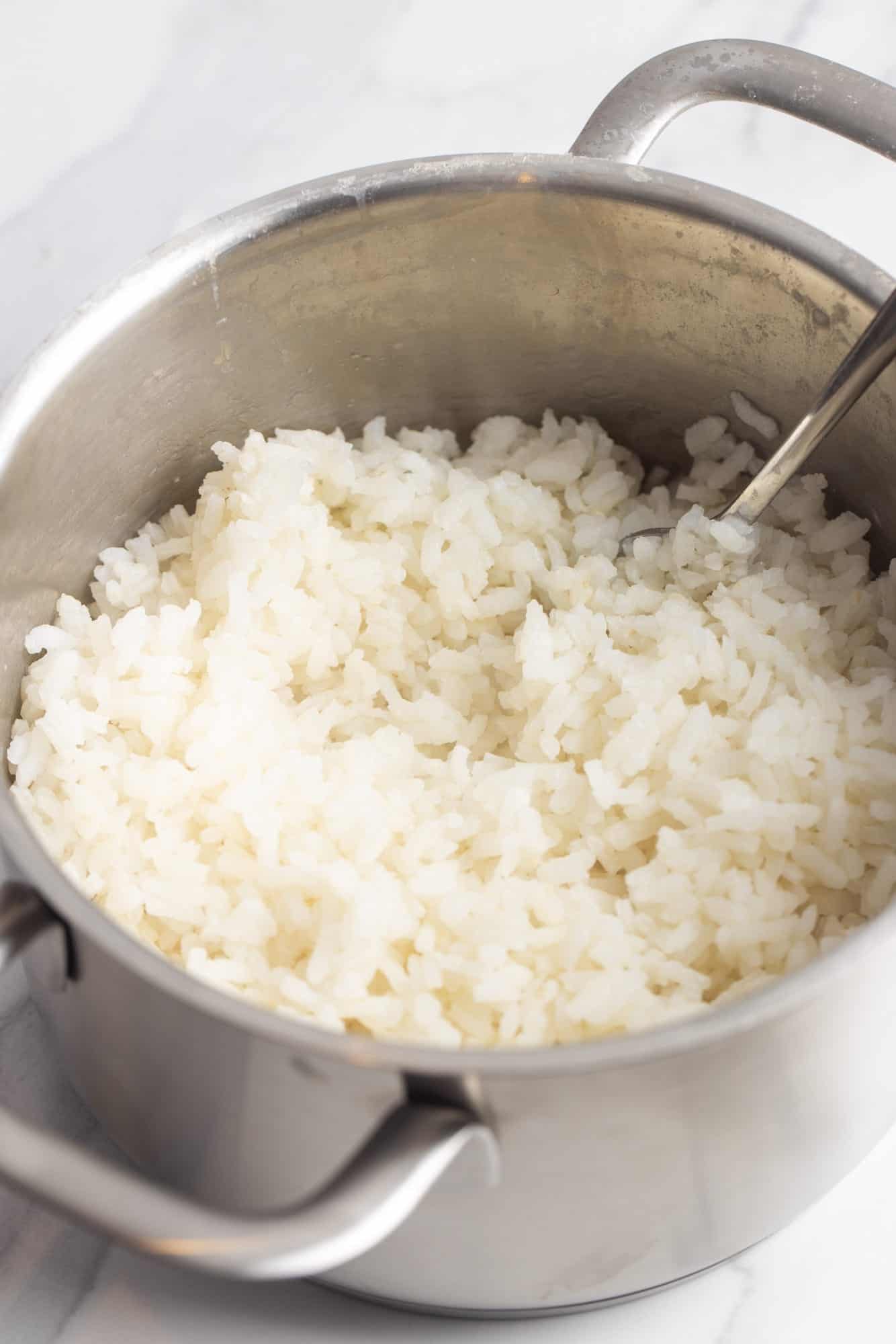a pot of cooked arborio rice.