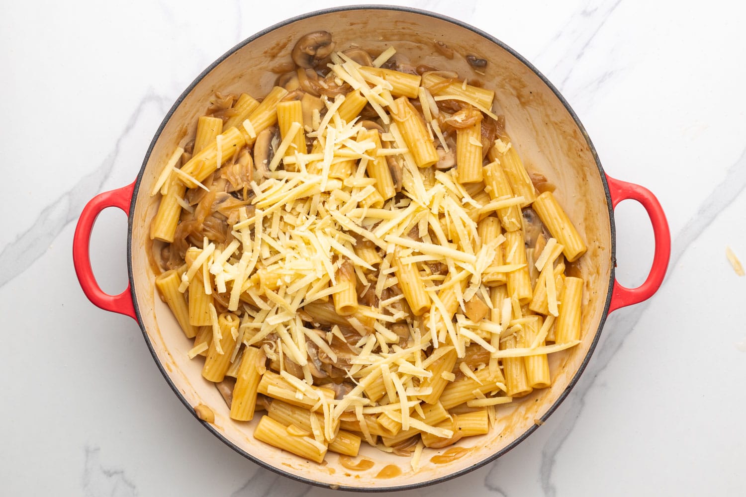 shredded cheese added to french onion pasta.
