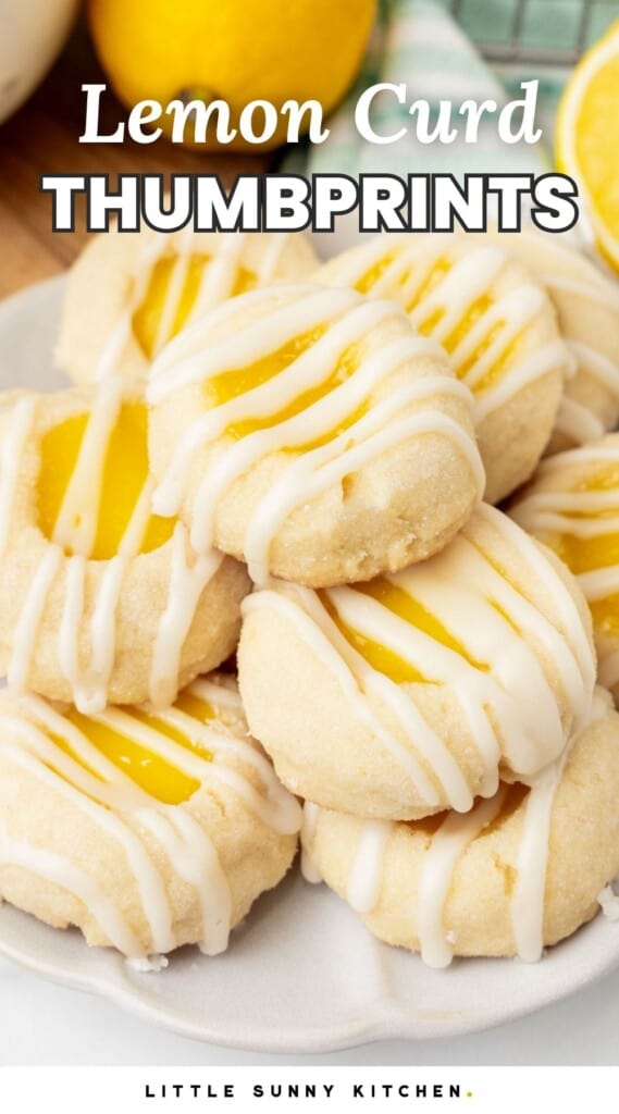a plate holding lemon cookies with icing. Text overlay at top of image says "lemon curd thumbprints"