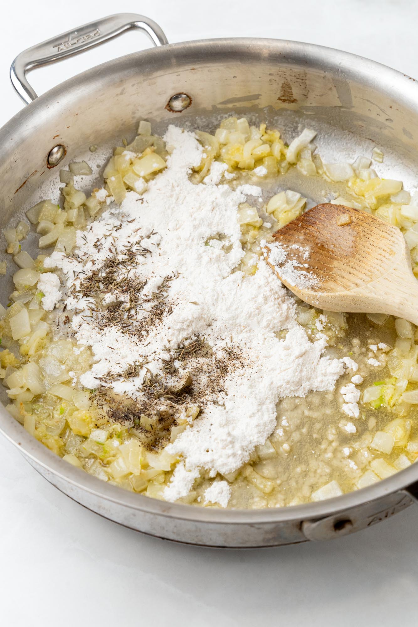 flour and seasonings added to sauteed onions in a skillet