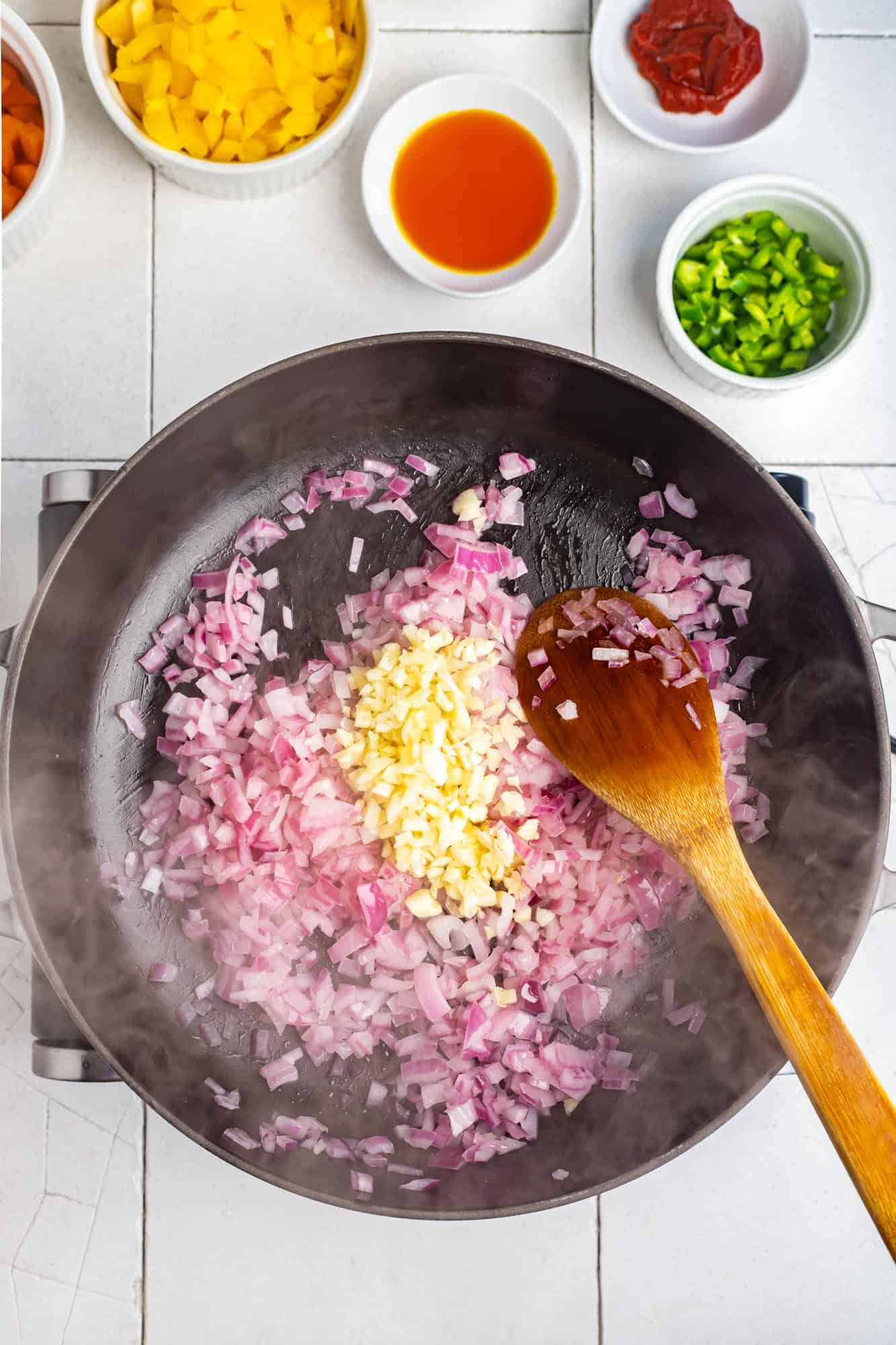 red onion and garlic sauteed in a nonstick skillet