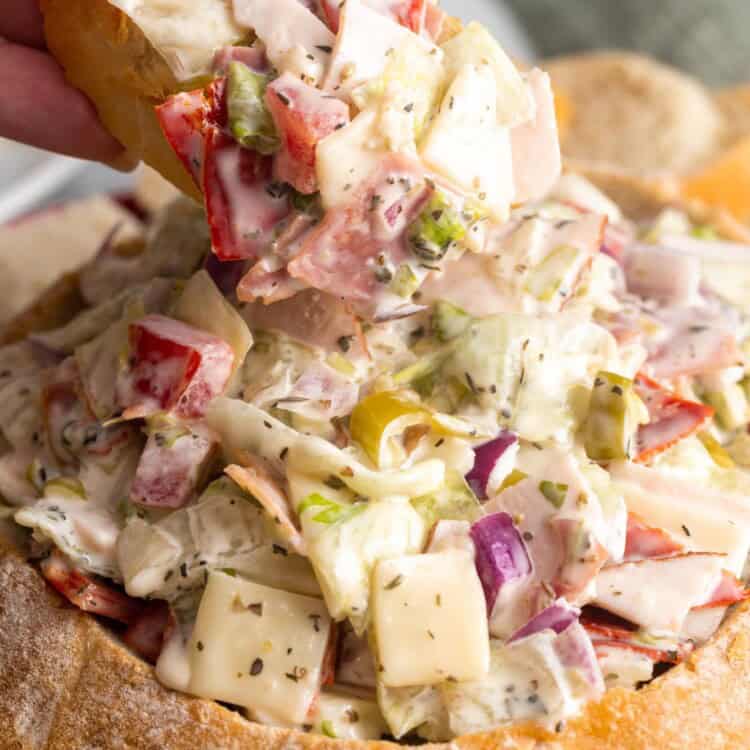 closeup of a bread bowl of Italian Hoagie dip.