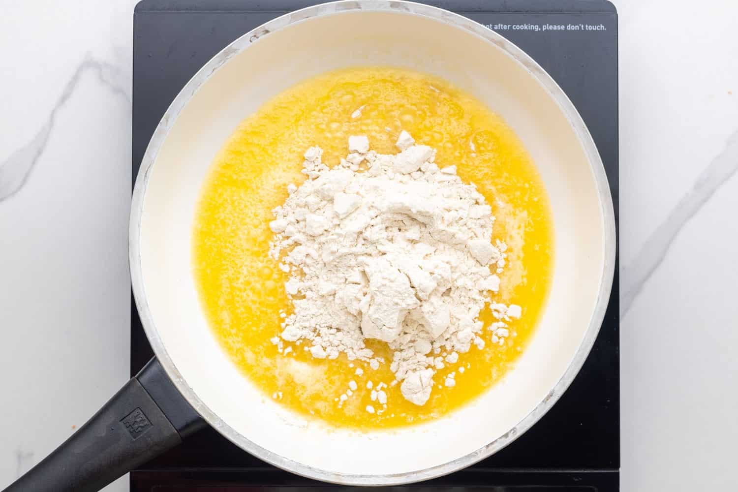 butter and flour cooked together in a saucepan. 