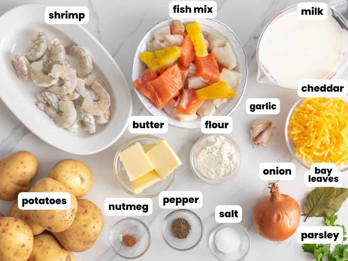 The ingredients needed to make fish pie with frozen fish mix, shrimp, potatoes, and seasonings.