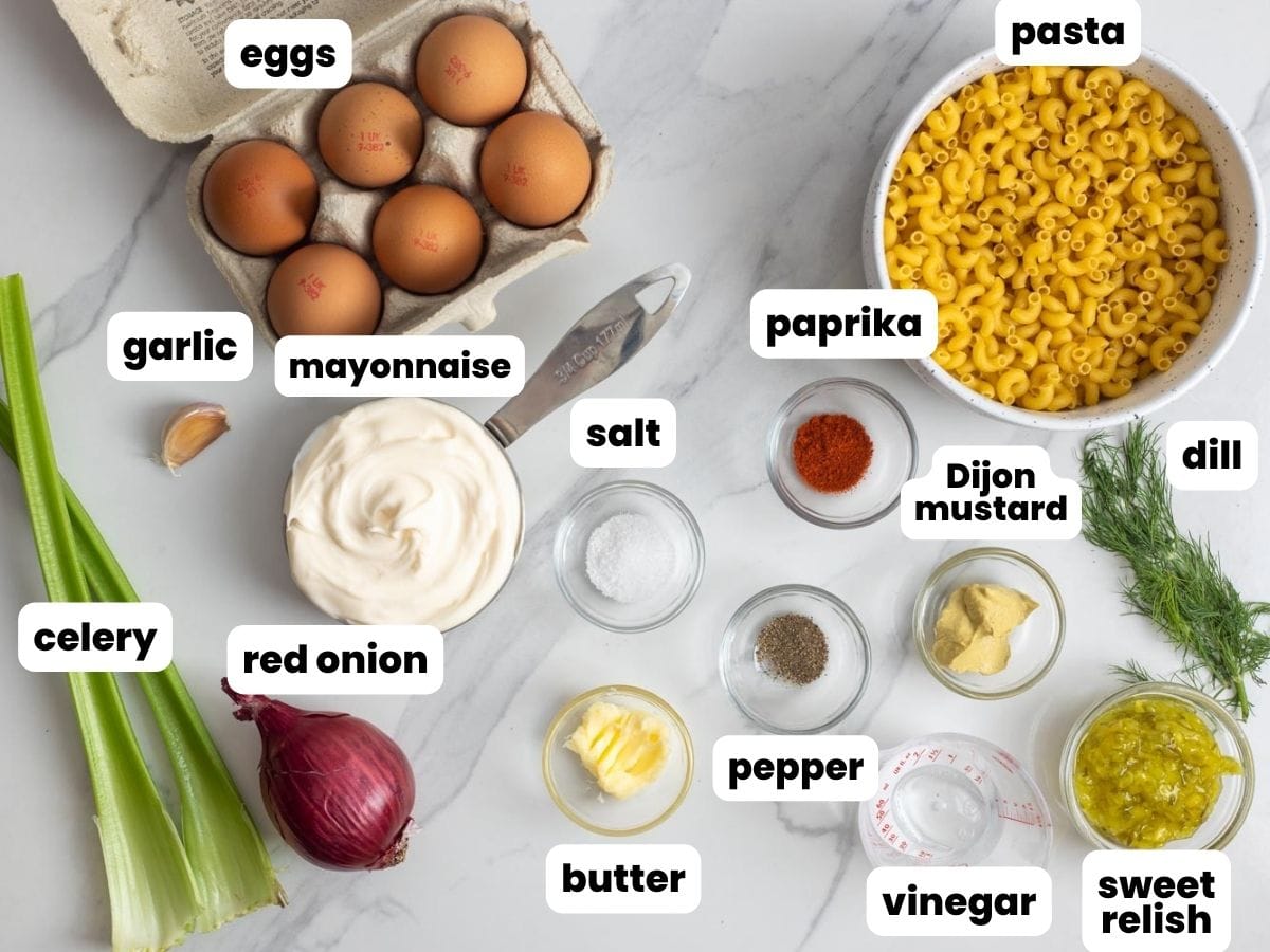 The ingredients needed to make Deviled Egg Pasta salad with a creamy dressing.