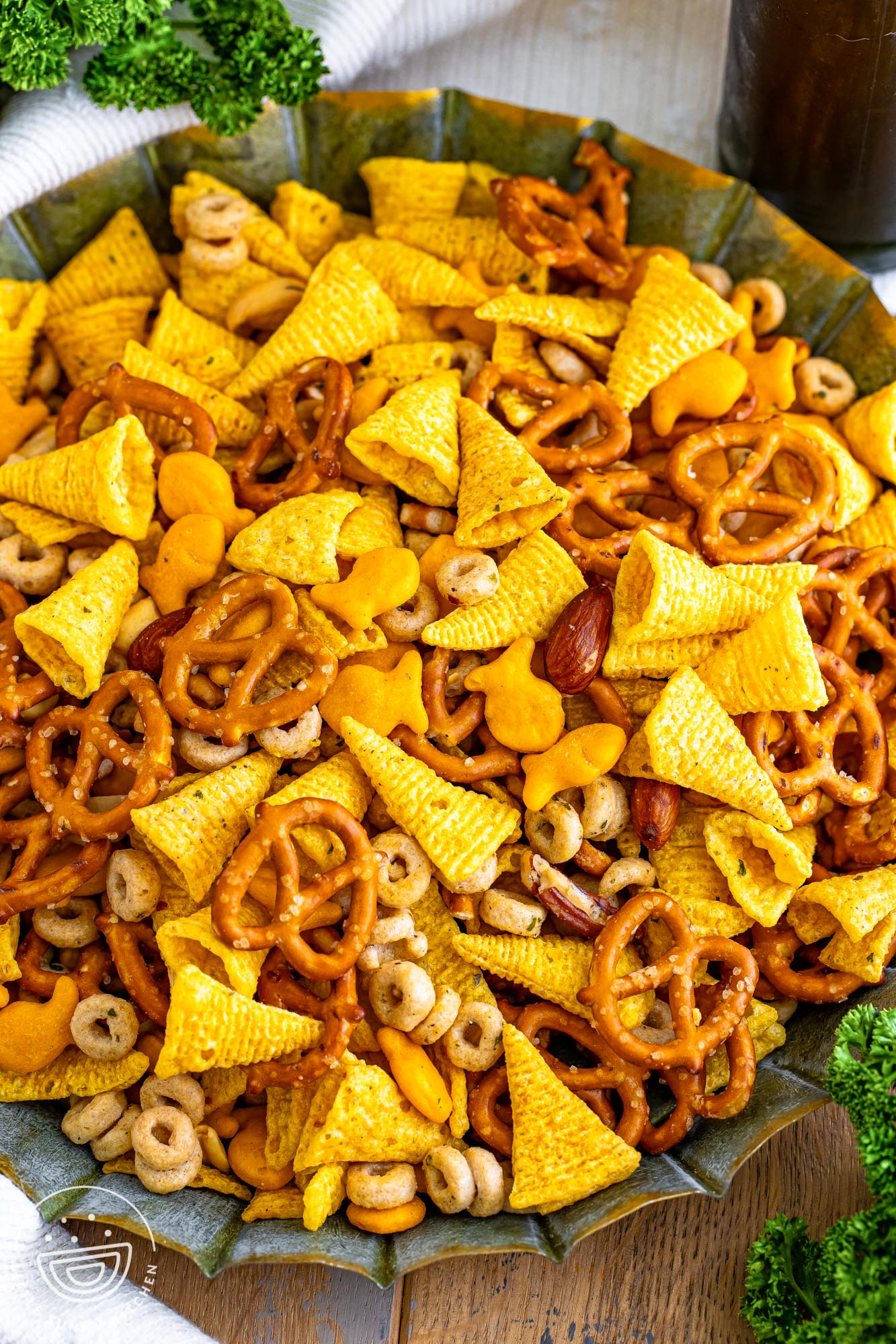 Ranch Bugles Snack mix filling a decorative metal bowl.