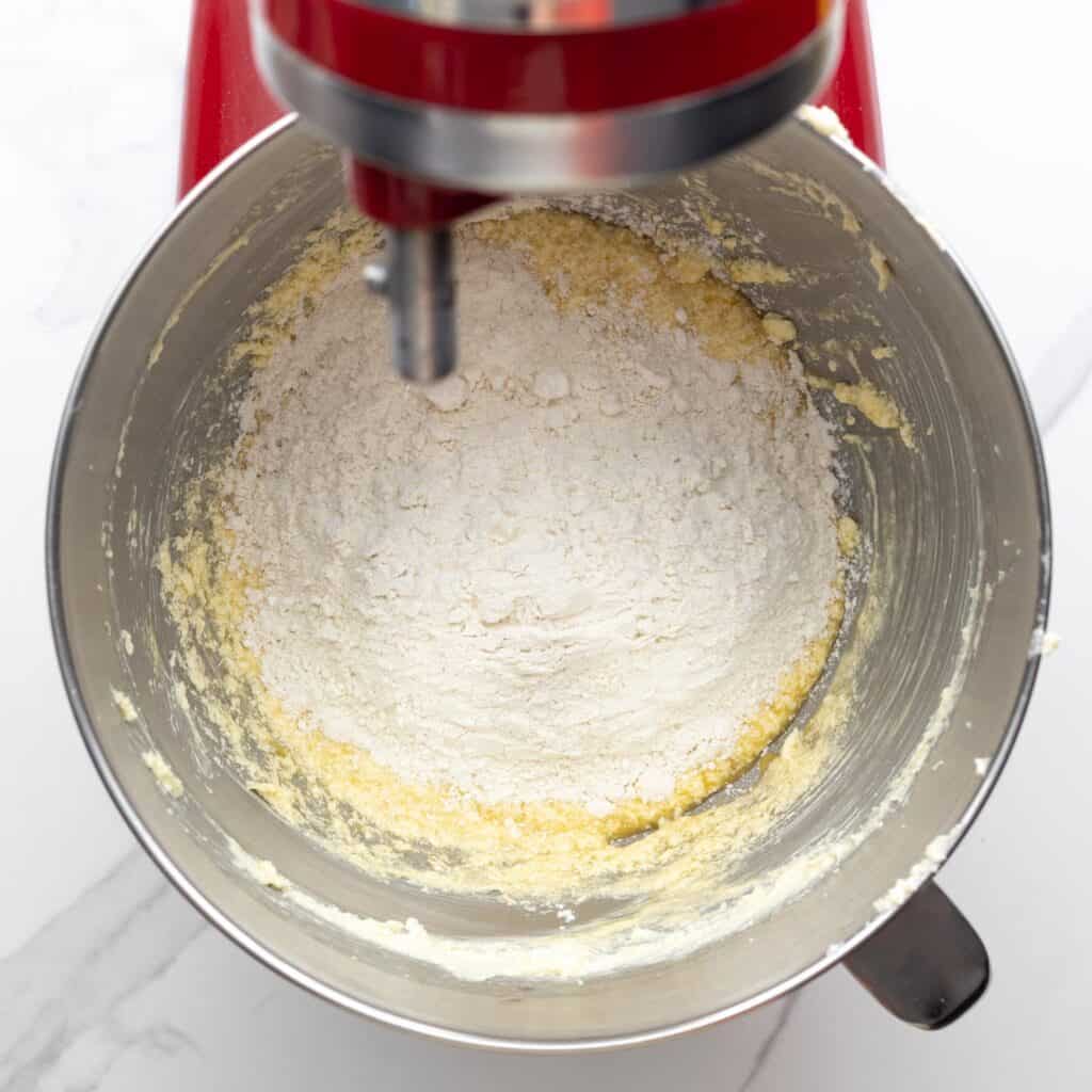 dry ingredients added to wet ingredients in the bowl of a stand mixer.