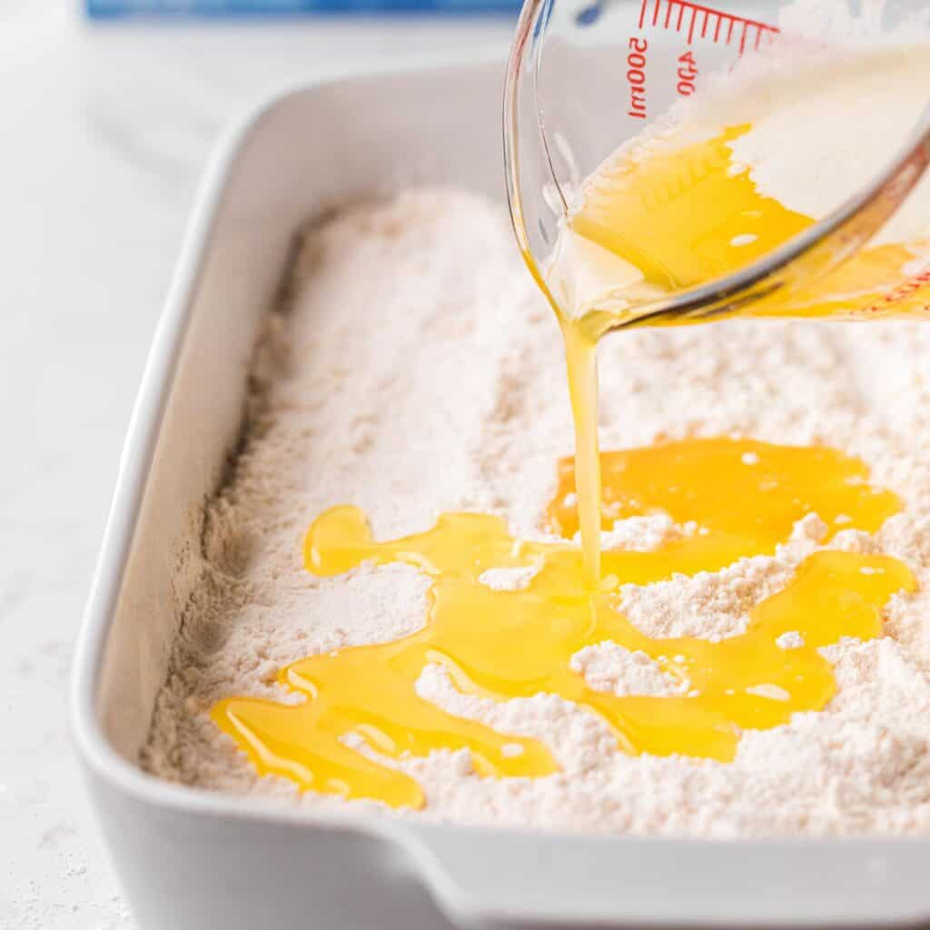 melted butter poured over the cake mix to make a dump cake.