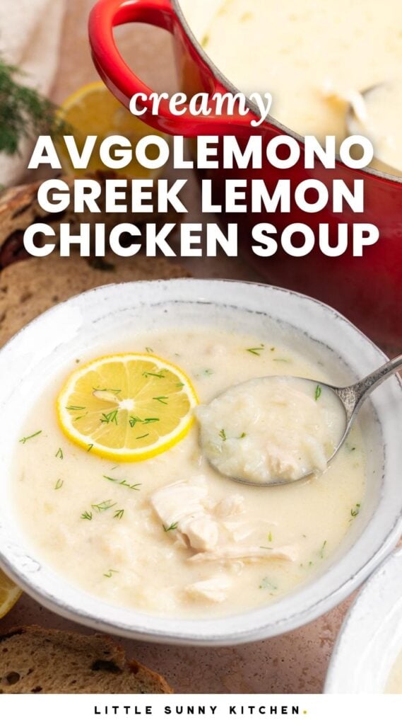 a rustic ceramic bowl of creamy chicken soup with a lemon slice in it. Text overlay says "creamy avgolemono greek lemon chicken soup"