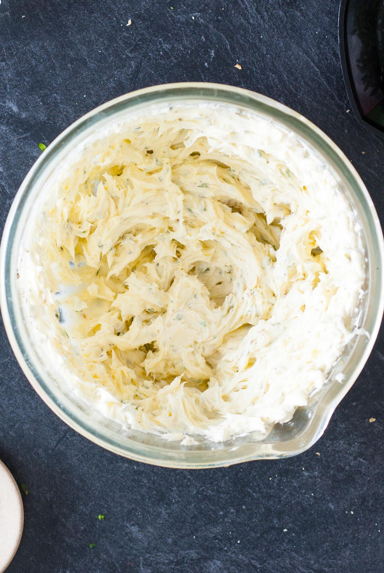 whipped herb garlic butter in a mixing bowl.