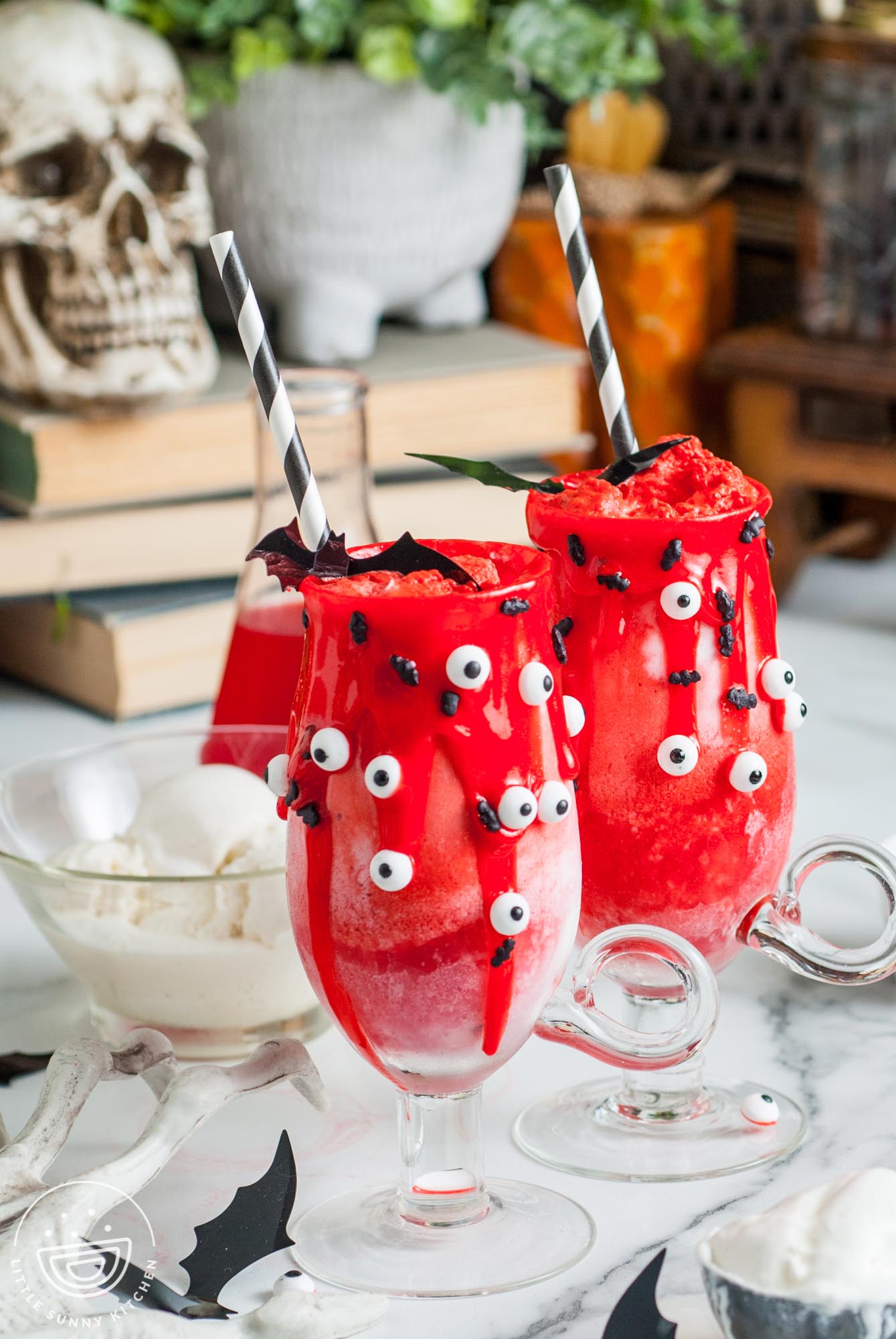 2 Halloween Vampire Floats with a skull in the background