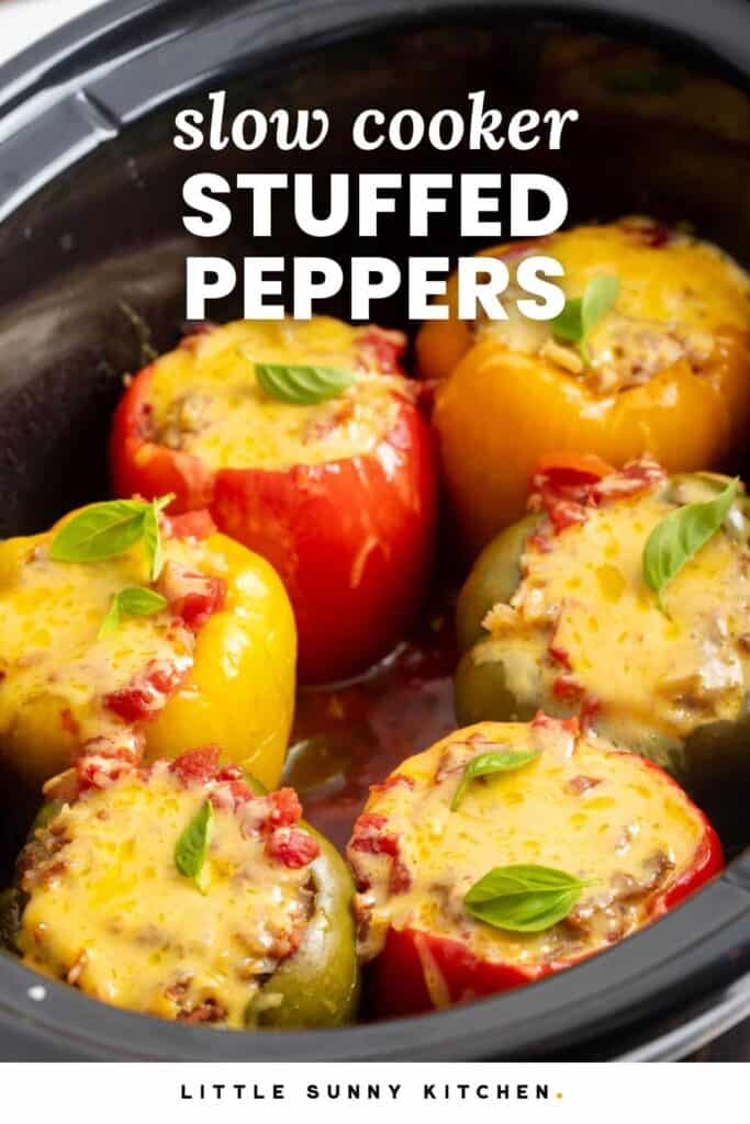 stuffed peppers in a slow cooker topped with melted cheese.